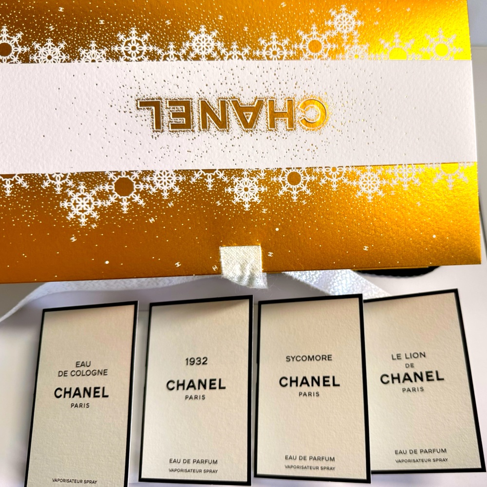 Chanel Les Exclusifs samples nested in a gold gift bag, Sycomore, 1932, le Lion